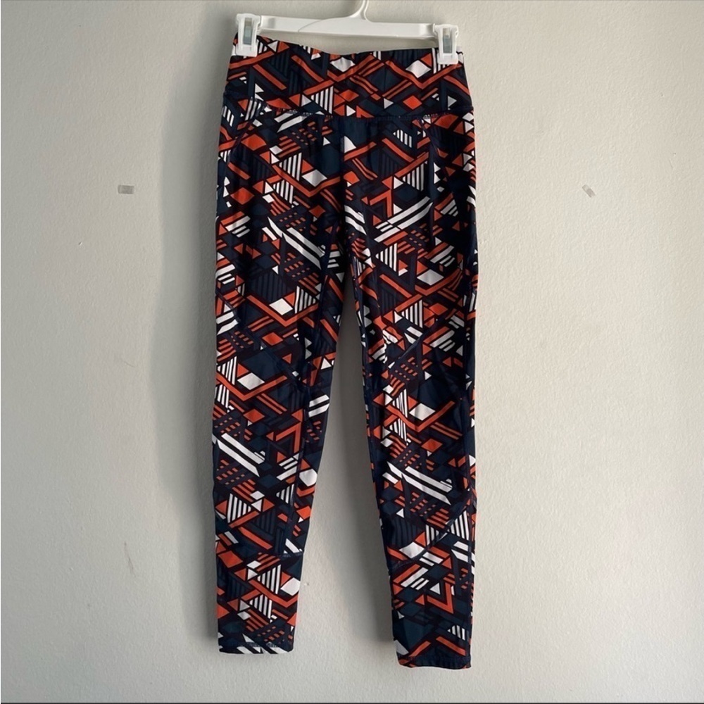 Sweaty Betty The Power pattern orange and teal 7/8 lux leggings